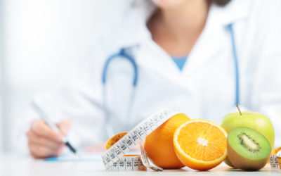 Nutritionist Doctor is writing a prescription. Focus on fruit